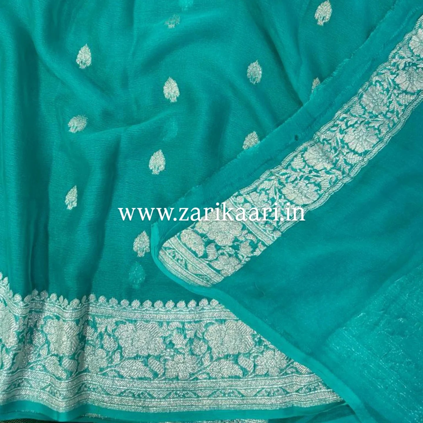 Sky-Blue Banarasi Pure Handloom Chiffon Kadhwa Saree with Ropa Boti.