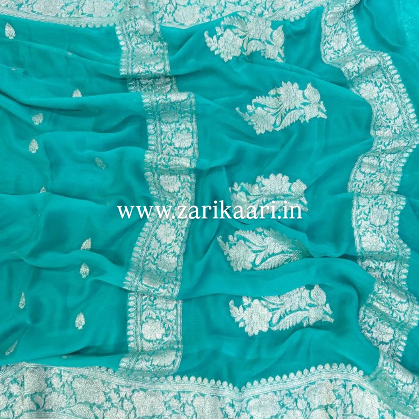 Sky-Blue Banarasi Pure Handloom Chiffon Kadhwa Saree with Ropa Boti.